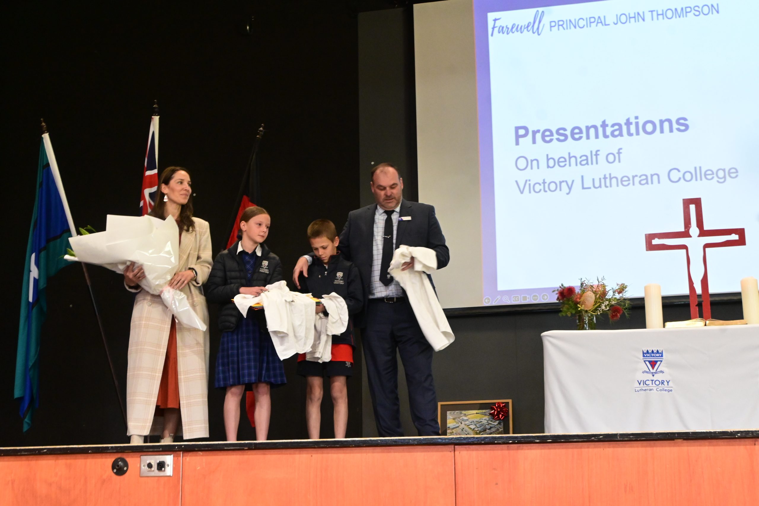 Victory farewells Principal Mr John Thompson, with wife, Mrs Laura Thompson 
and children Maggie (Year 5) and Elijah (Year 6) 